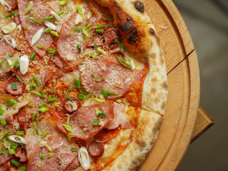 Hawaiian pizza with ham and pineapple